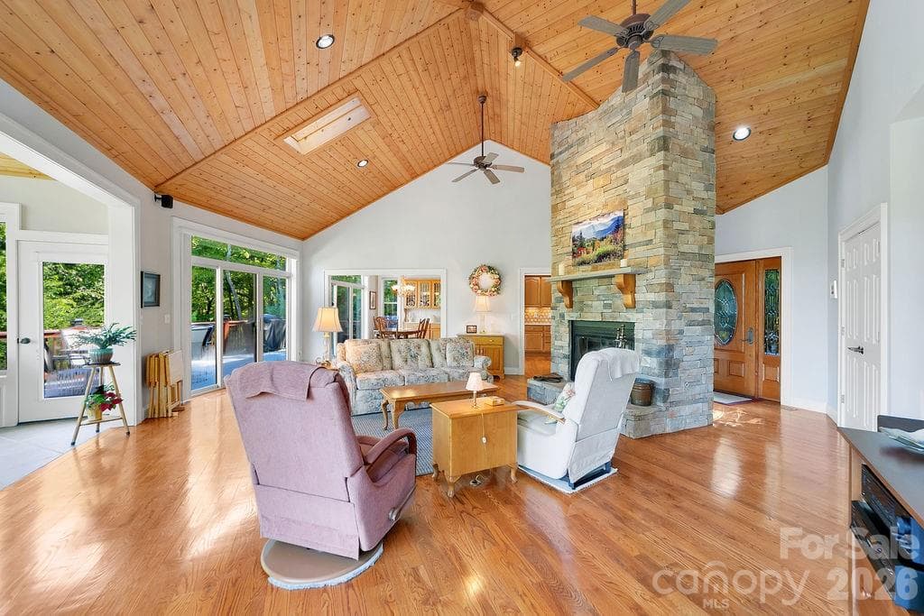Cultured stone wood burning fireplace - 1228 Ugugu Drive, Brevard