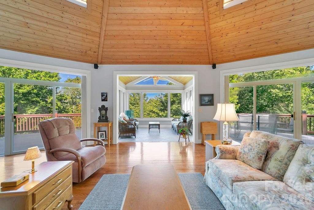 Living area into sunroom - 1228 Ugugu Drive, Brevard