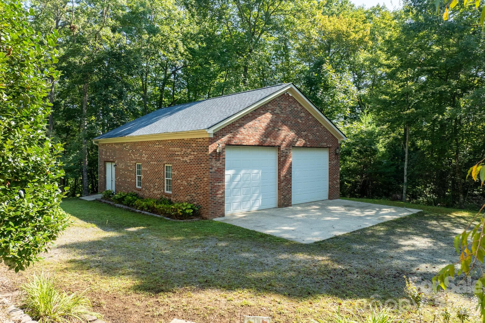 This is one of the highlights of the property! There is nothing better than an oversized garage! - 1886 Tanasee Gap Road, Balsam Grove
