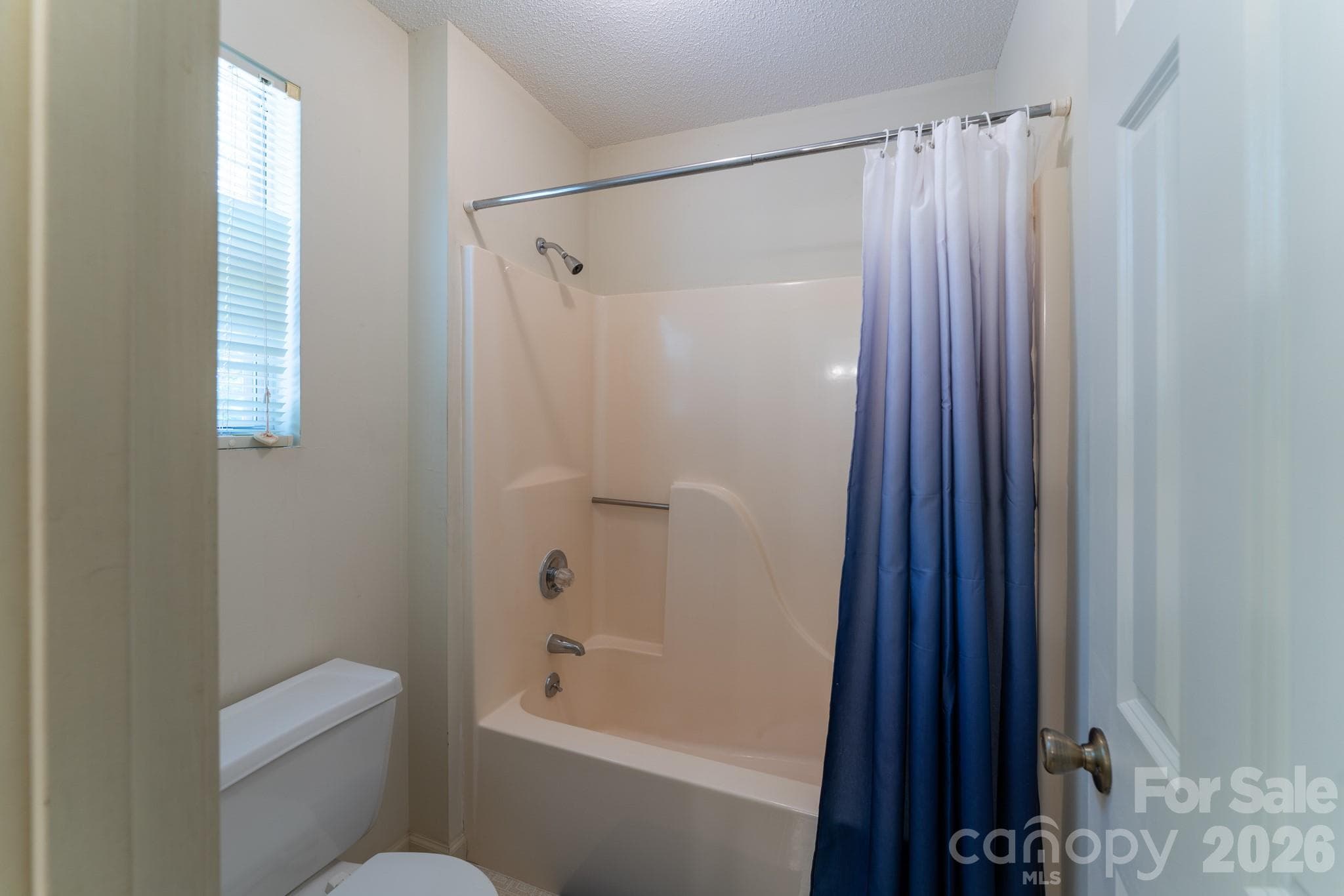 They share a full bathroom. The tub & commode are separate from the sink area. - 1886 Tanasee Gap Road, Balsam Grove