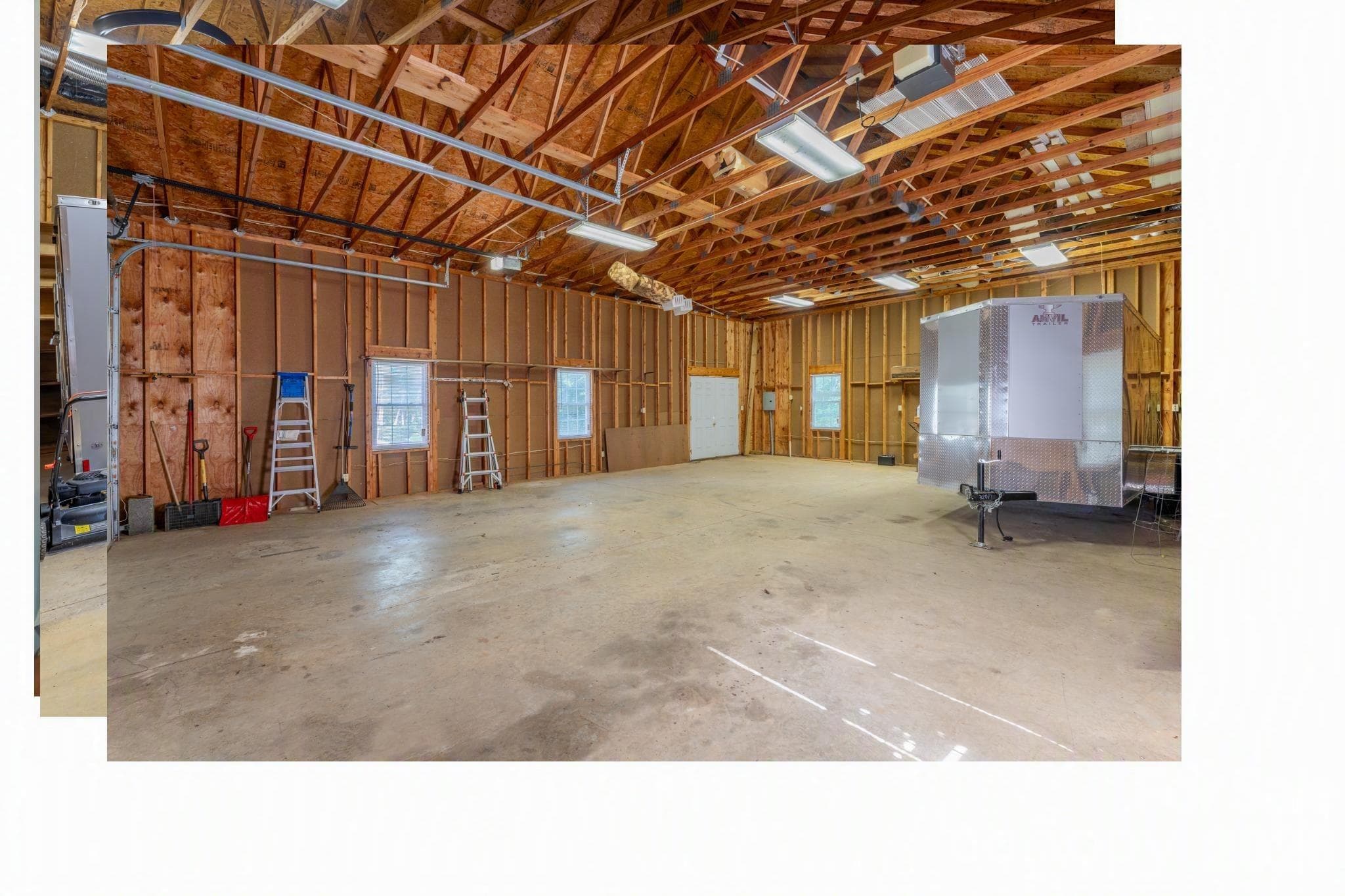 Over 1200 sq. ft. of space to add a workspace and still have room for your vehicles. - 1886 Tanasee Gap Road, Balsam Grove