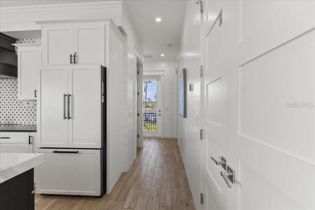 Hallway to Bedrooms from Kitchen - 239 S HARBOR DR, HOLMES BEACH