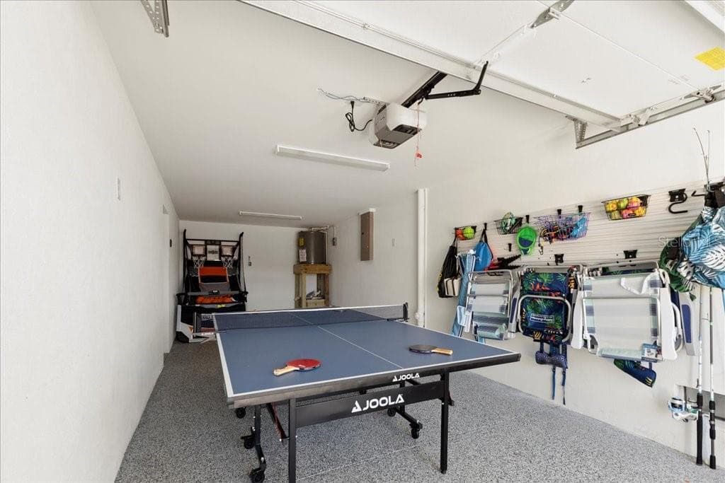 Garage Ping Pong Table and Beach Equipment - 239 S HARBOR DR, HOLMES BEACH
