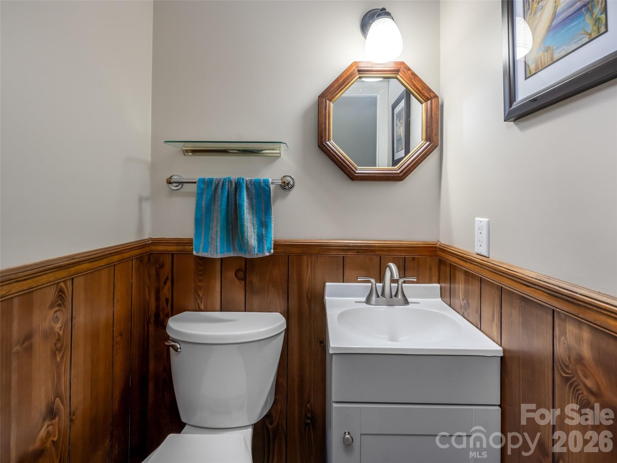 Main-level, renovated half-bath. - 1 Morris Drive, Weaverville