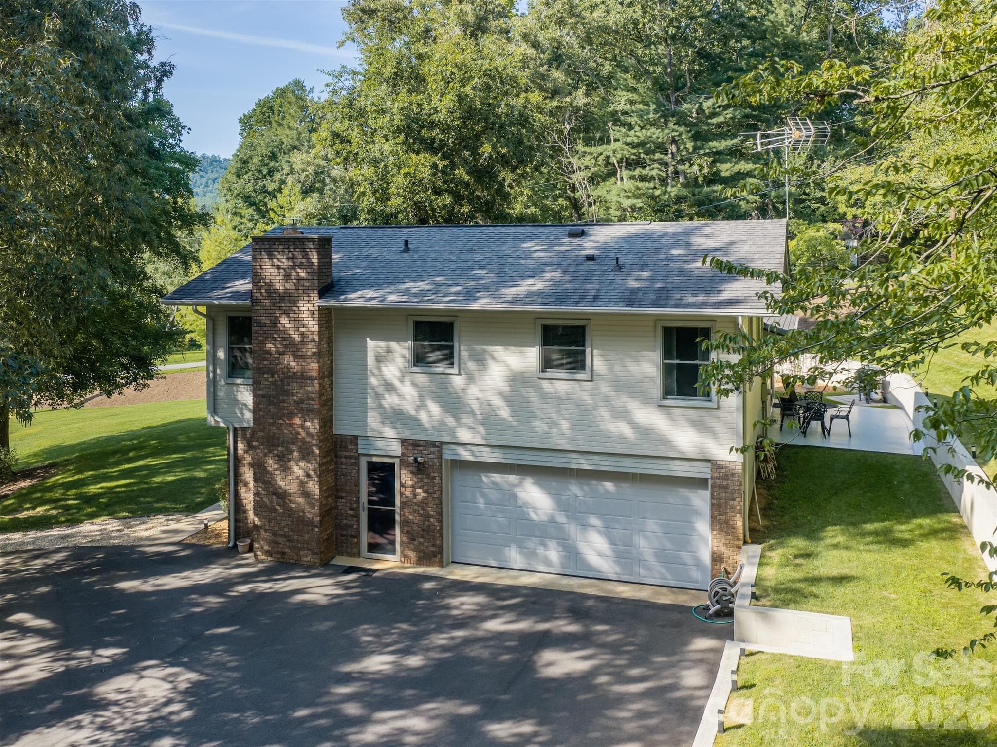 Insulated garage door and lots of parking. - 1 Morris Drive, Weaverville