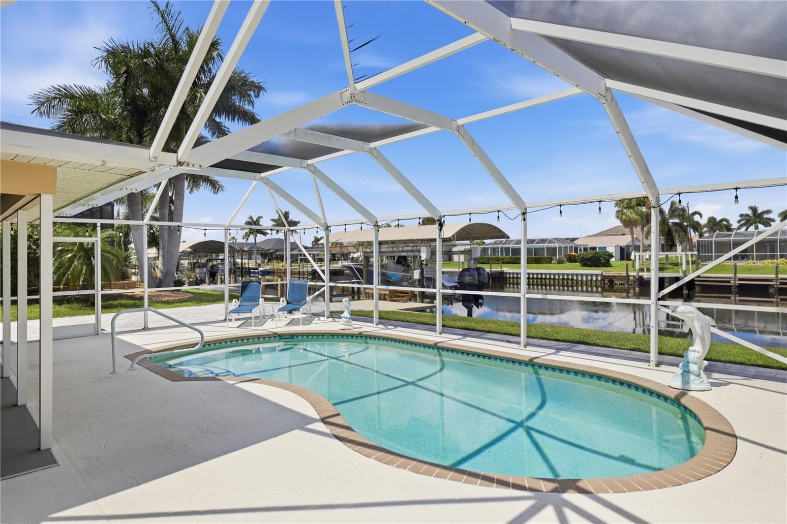 Beautiful pool area, pool deck just refinished - 136 SINCLAIR ST SE, PORT CHARLOTTE