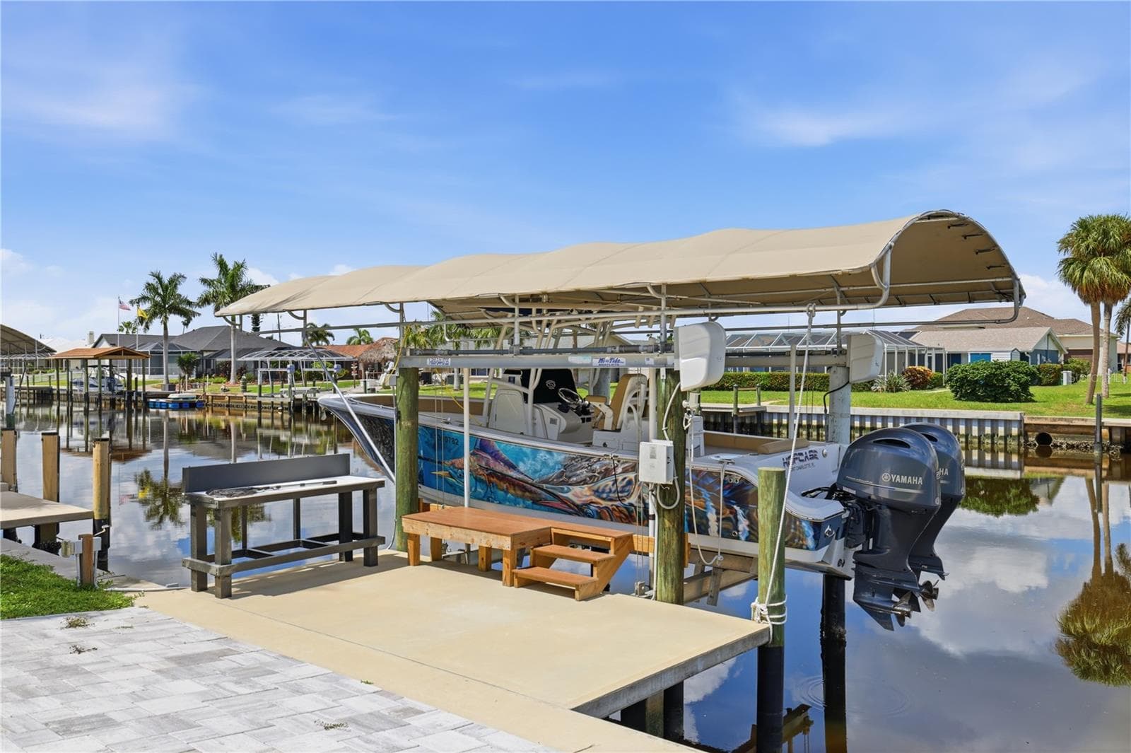 Covered boat lift - 136 SINCLAIR ST SE, PORT CHARLOTTE