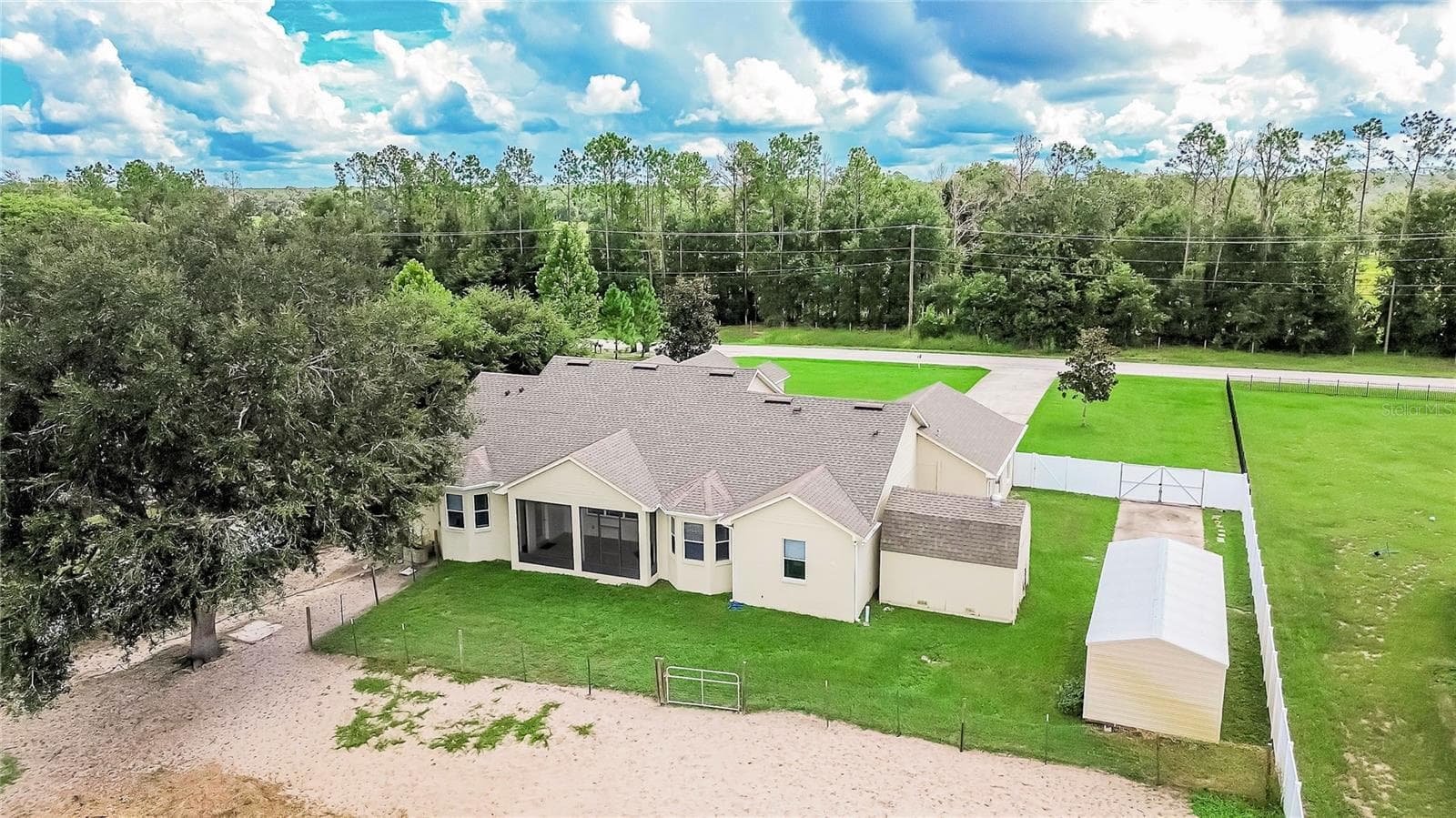 REAR OF HOME - 13975 MCINTOSH RD, THONOTOSASSA