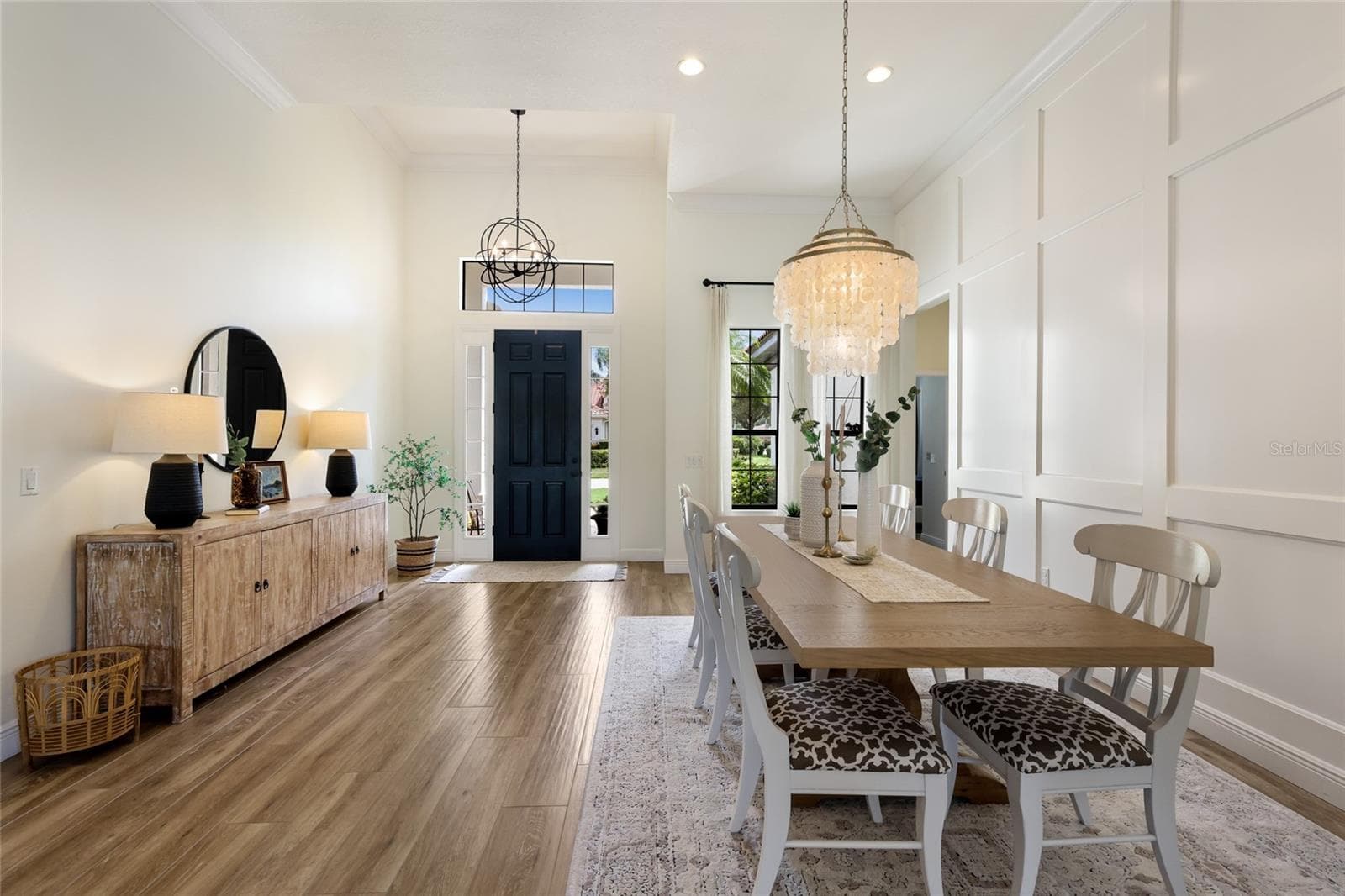 Custom wall detail in dining room - 13994 SIENA LOOP, LAKEWOOD RANCH
