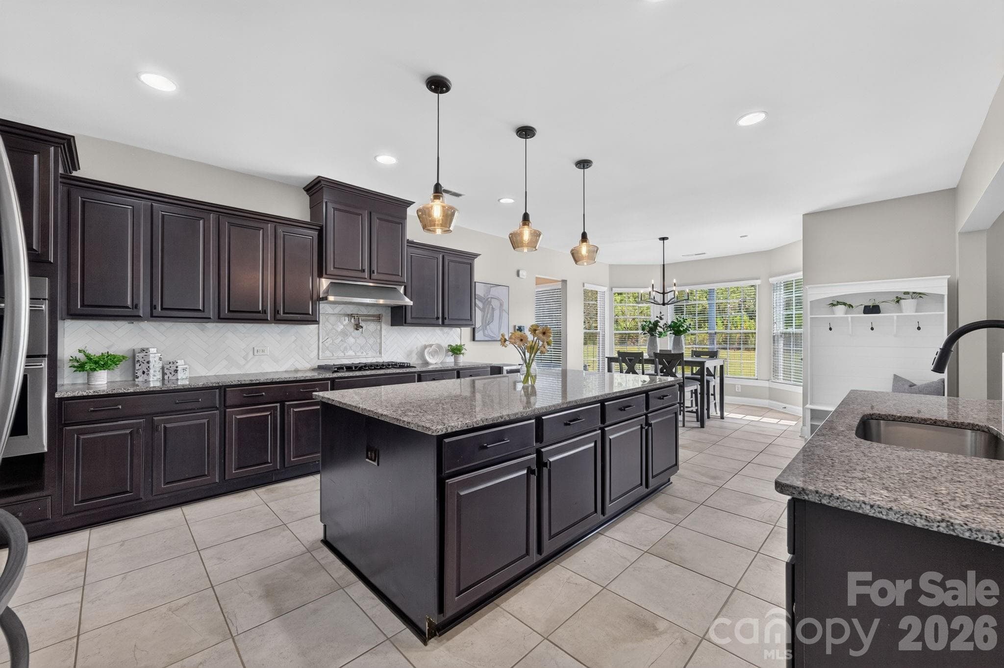 The heart of the home and every entertainers dream. - 15110 Brannock Hills Drive, Charlotte
