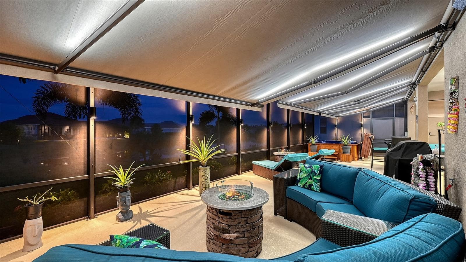 Outdoor living space with awnings - 13667 OLD CREEK CT, PARRISH