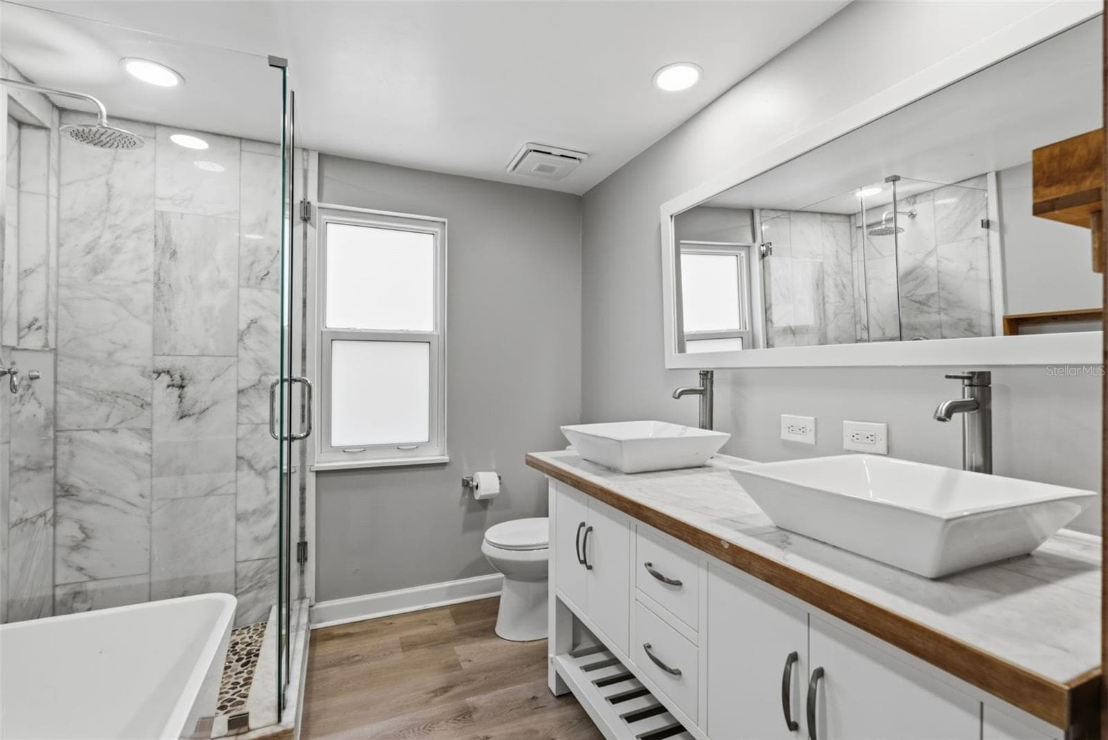 Bath #2 with free standing tub and seamless shower - 6701 13TH ST N, TAMPA