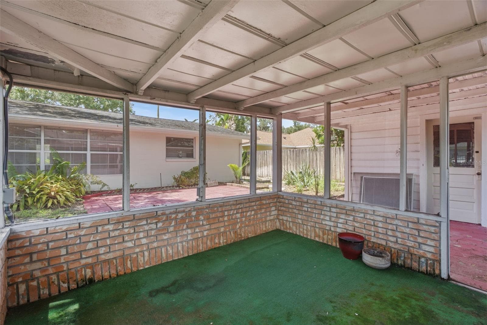 Interior of screened room - 6701 13TH ST N, TAMPA