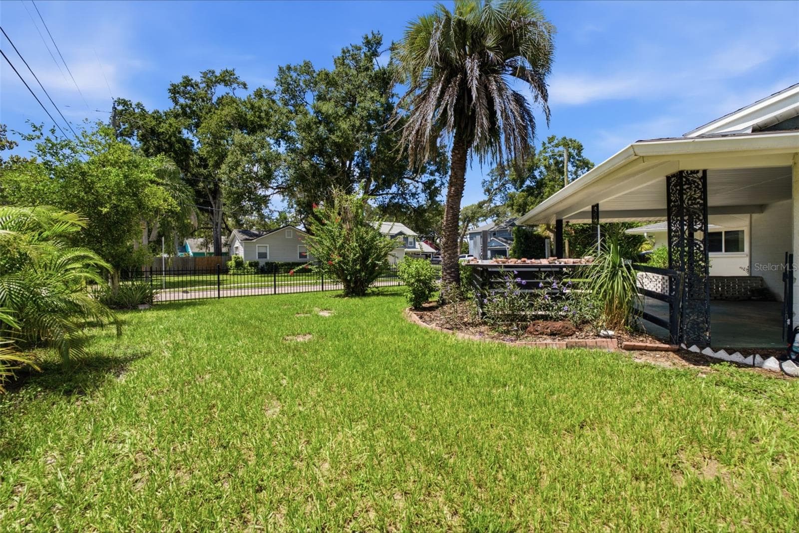 Fenced side yard - 6701 13TH ST N, TAMPA