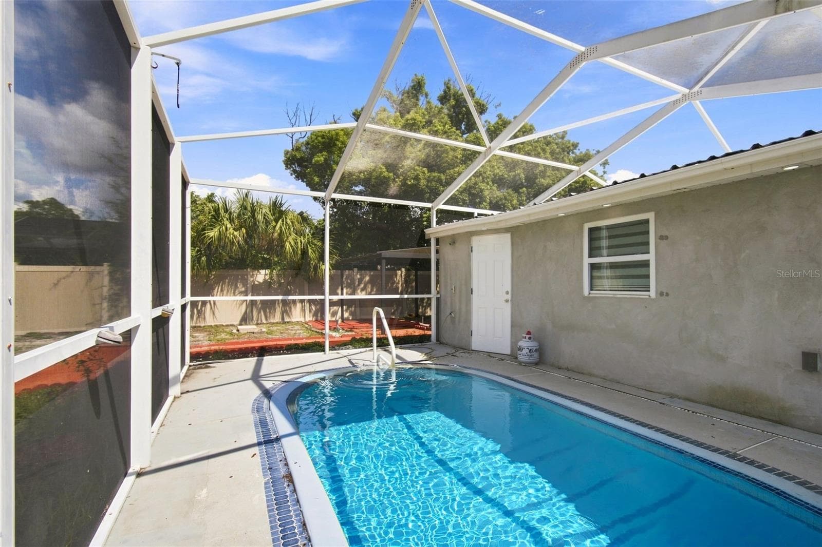 POOL IS VIRTUALLY FILLED WHILE REPAIRS ARE IN PROGRESS - 6463 1ST AVE N, ST PETERSBURG