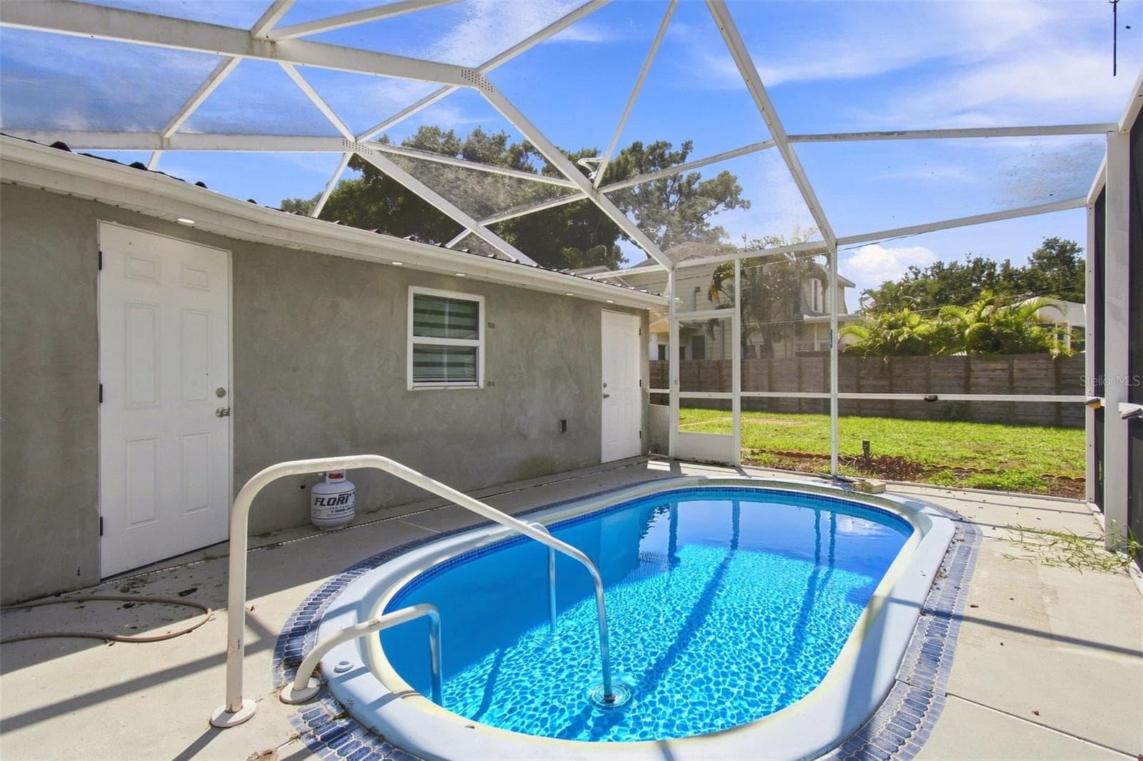 POOL IS VIRTUALLY FILLED WHILE REPAIRS ARE IN PROGRESS - 6463 1ST AVE N, ST PETERSBURG