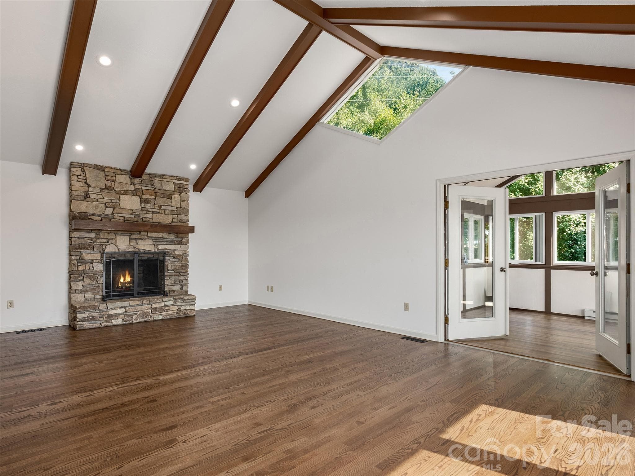Vaulted family room with dramatic stone fireplace - 288 Roberts Drive, Laurel Park