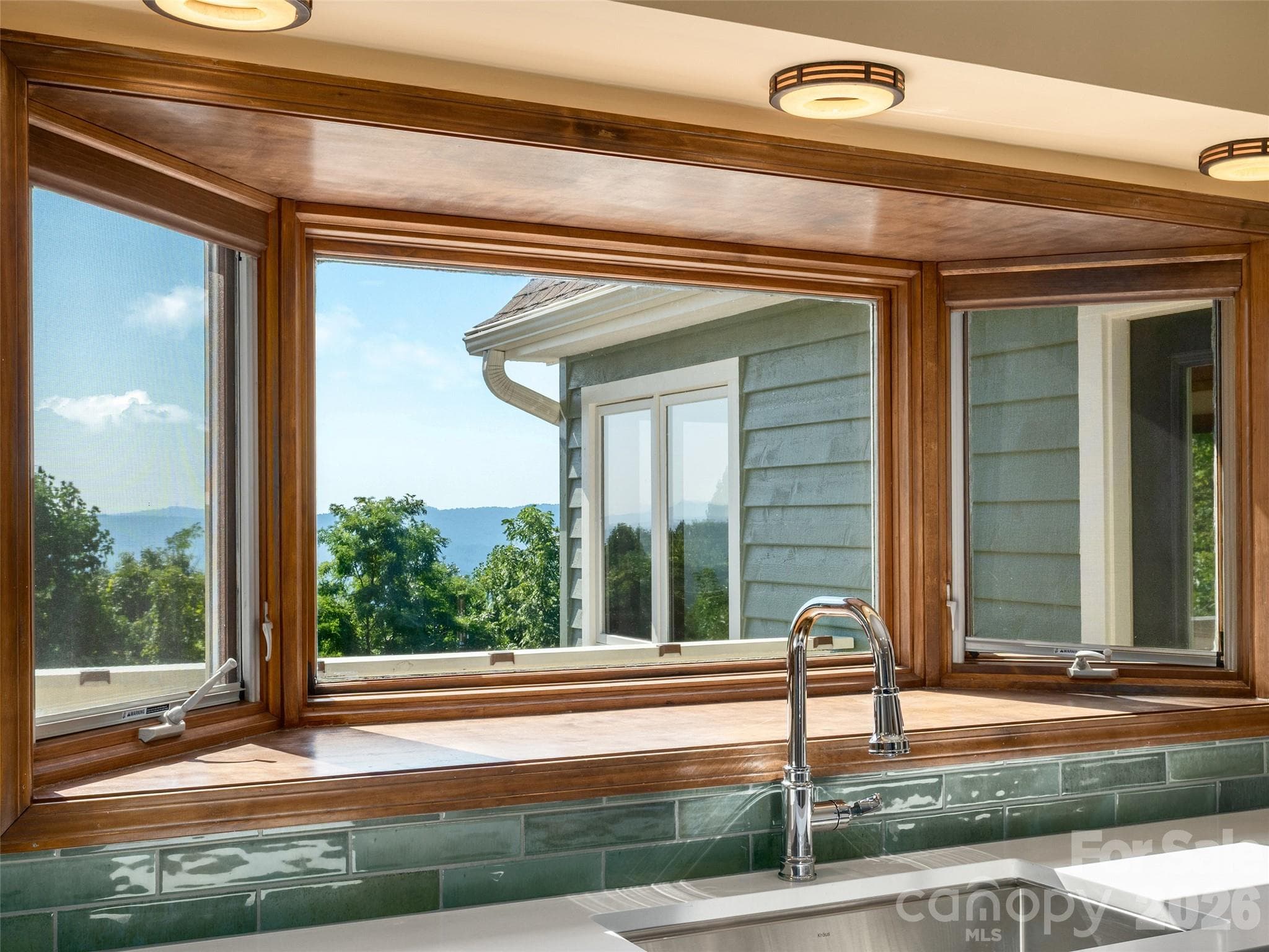 Kitchen bay window with lovely mountain views - 288 Roberts Drive, Laurel Park