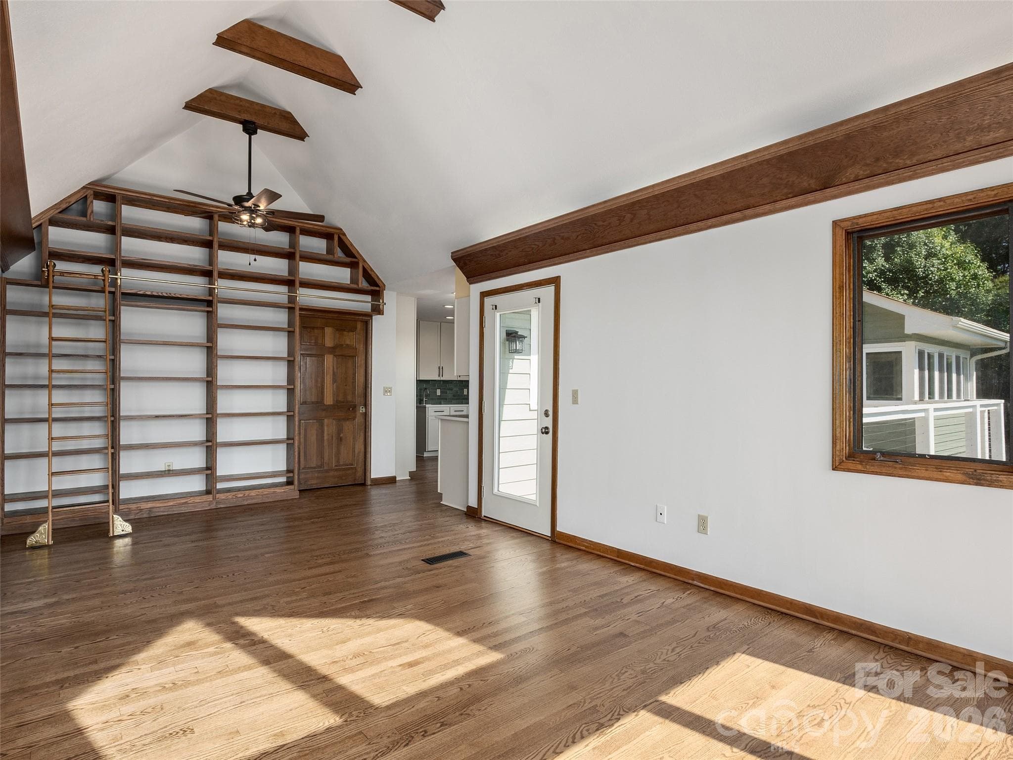 Dining room with floor to ceiling bookcase - 288 Roberts Drive, Laurel Park