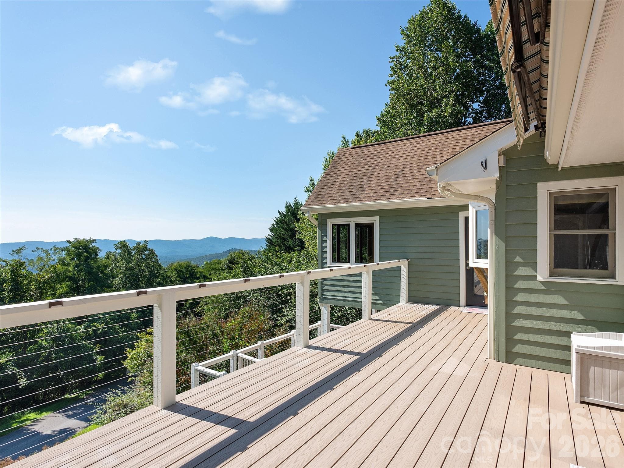 Main level deck with Azek decking and remotely controlled awning - 288 Roberts Drive, Laurel Park