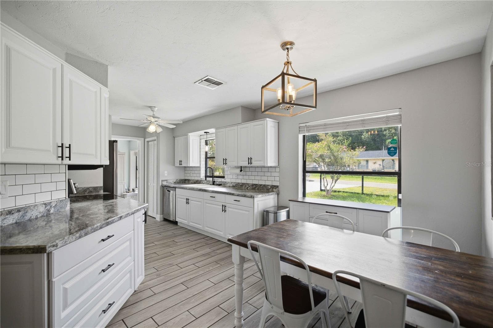 View into Dining/Kitchen - 11615 SE 129TH LN, OCKLAWAHA