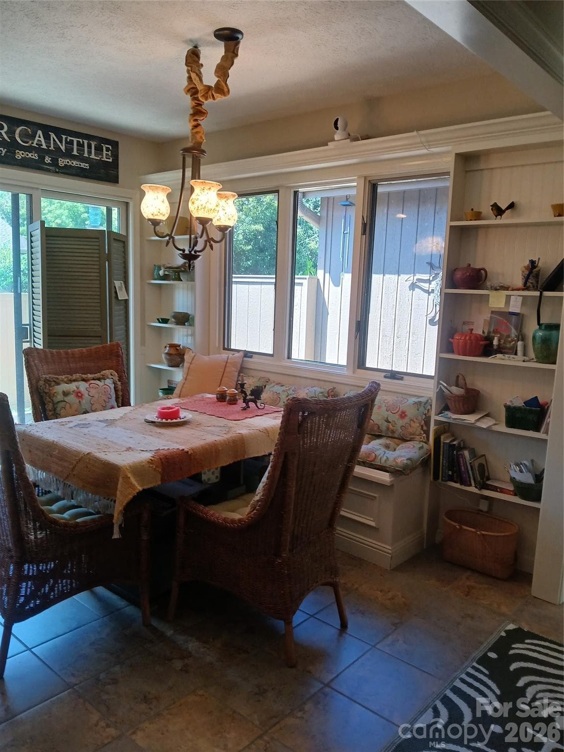 Breakfast nook with built in shelves and storage bench seat - 304 red oak Drive, Hendersonville