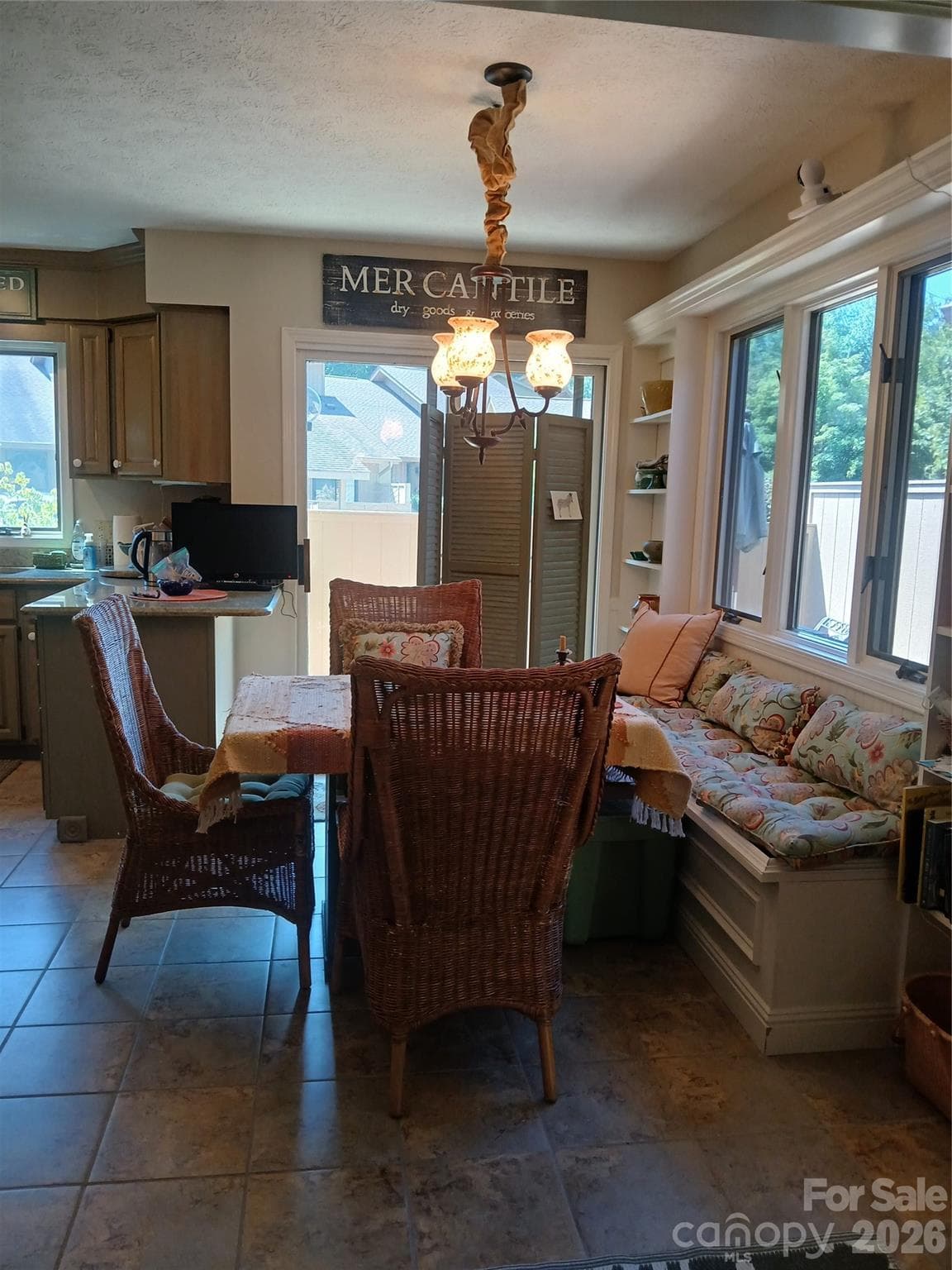 View from breakfast nook to windows and sliding door - 304 red oak Drive, Hendersonville