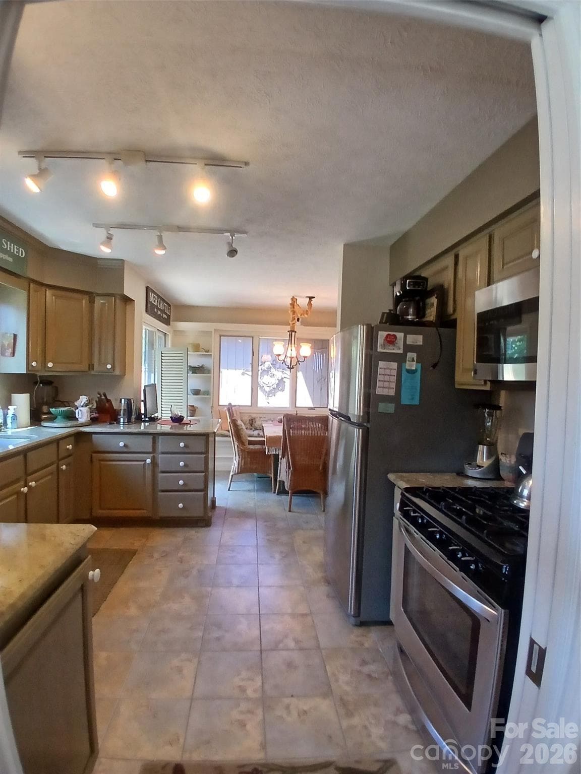View from dining to kitchen - 304 red oak Drive, Hendersonville
