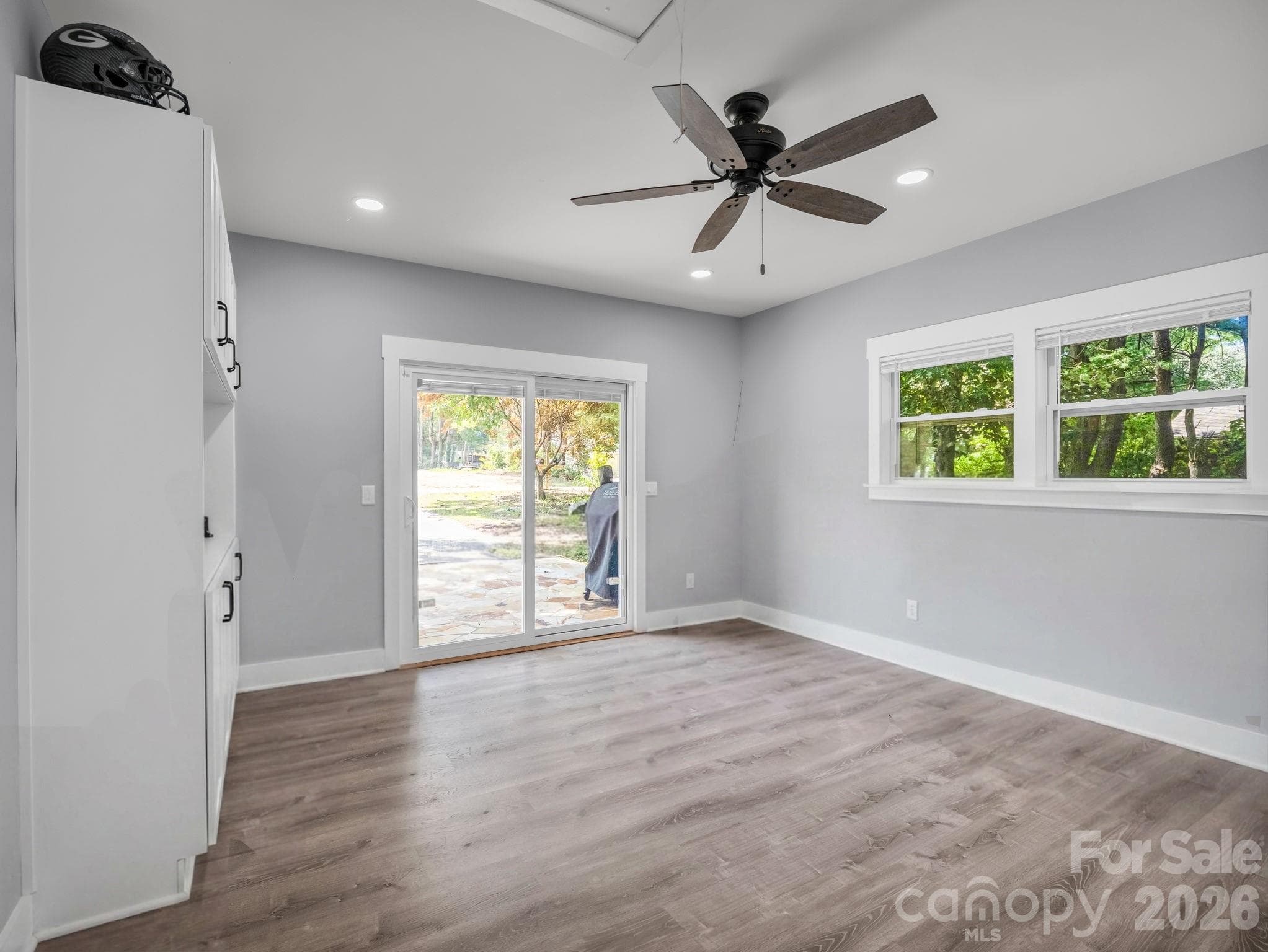 Versatile room off of kitchen could be a home office, mudroom, or man cave - 3208 Florida Drive, Hendersonville