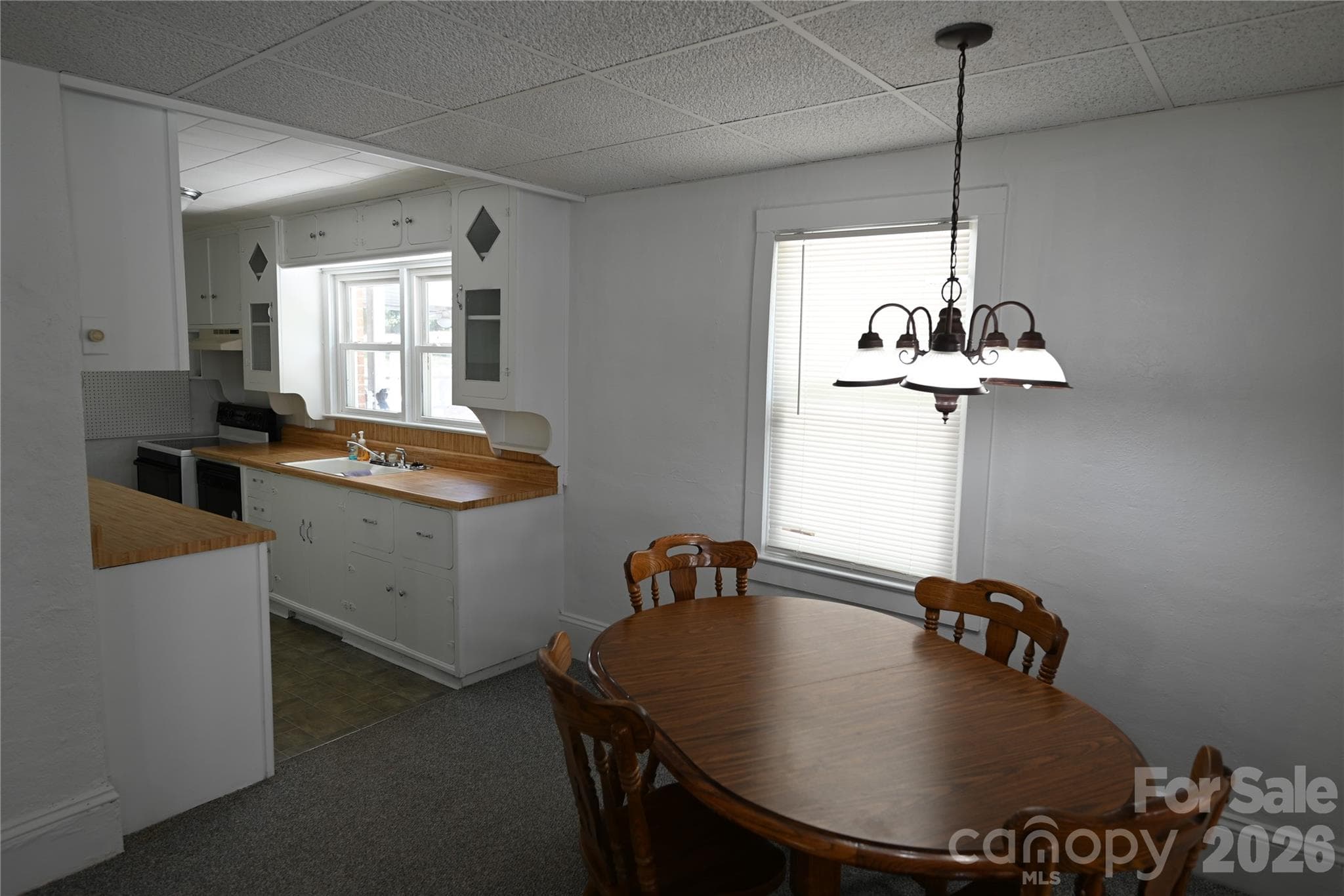 Single Family Residence at 105 Owens Avenue NE, Drexel, photo 9 of 38