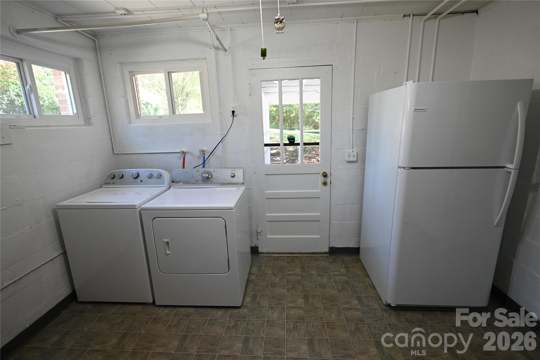Single Family Residence at 105 Owens Avenue NE, Drexel, photo 14 of 38
