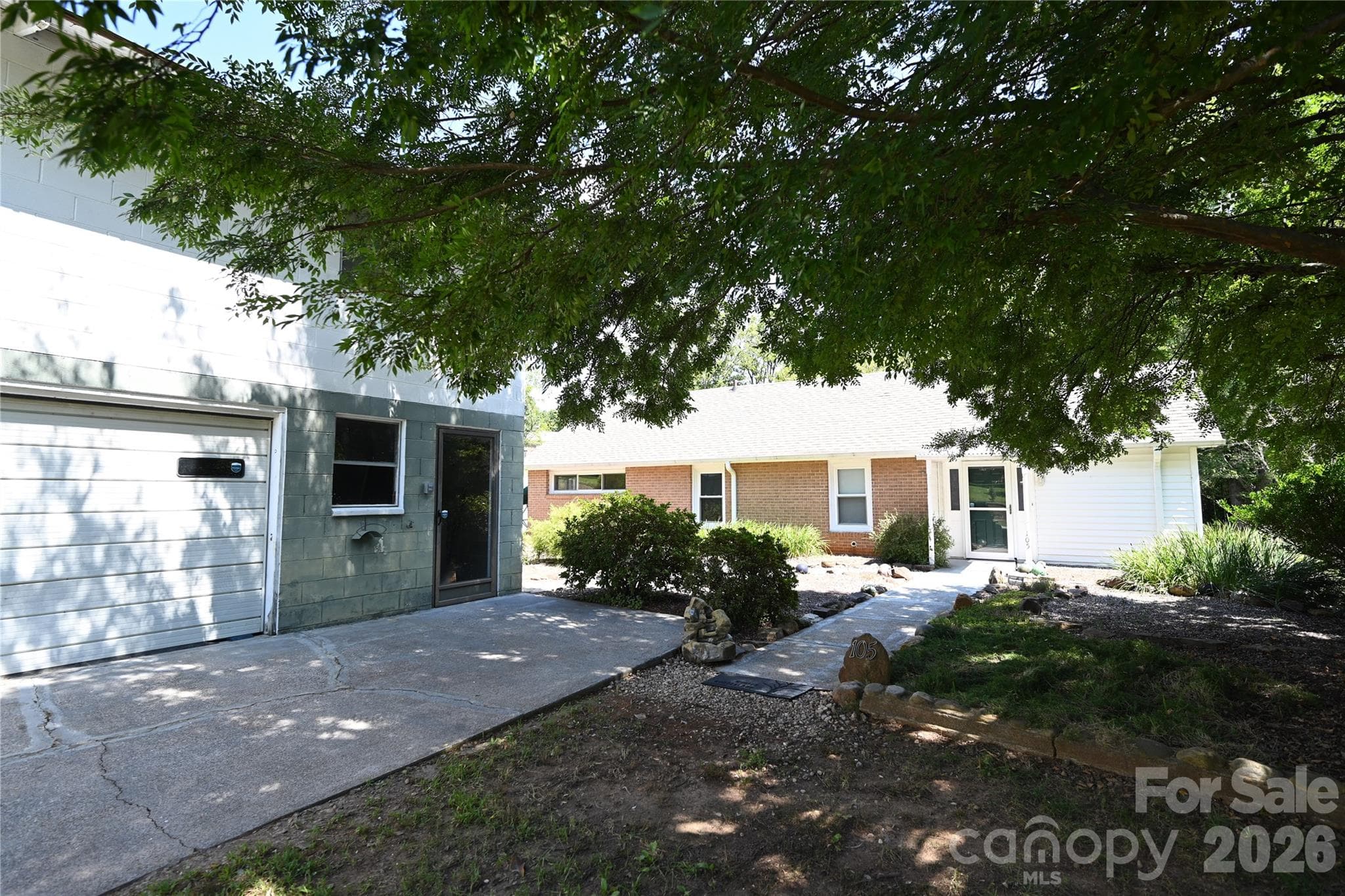 Single Family Residence at 105 Owens Avenue NE, Drexel, photo 27 of 38