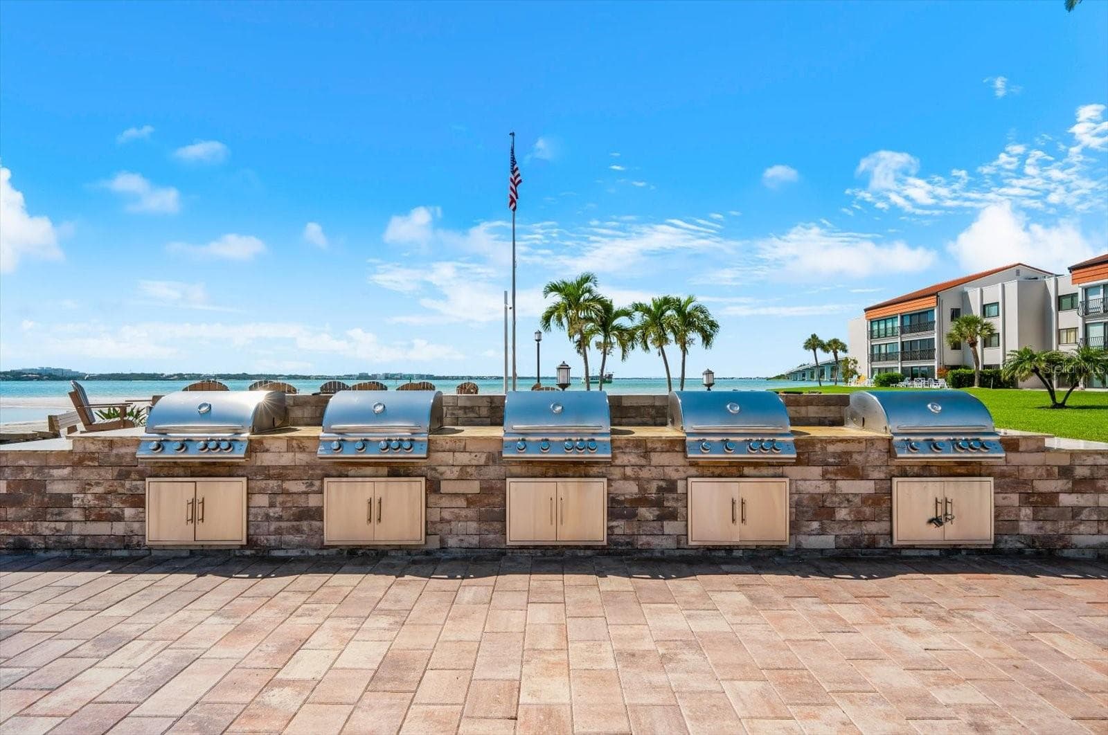 The outdoor grill area is large and inviting. - 868 BAYWAY BLVD #307, CLEARWATER BEACH
