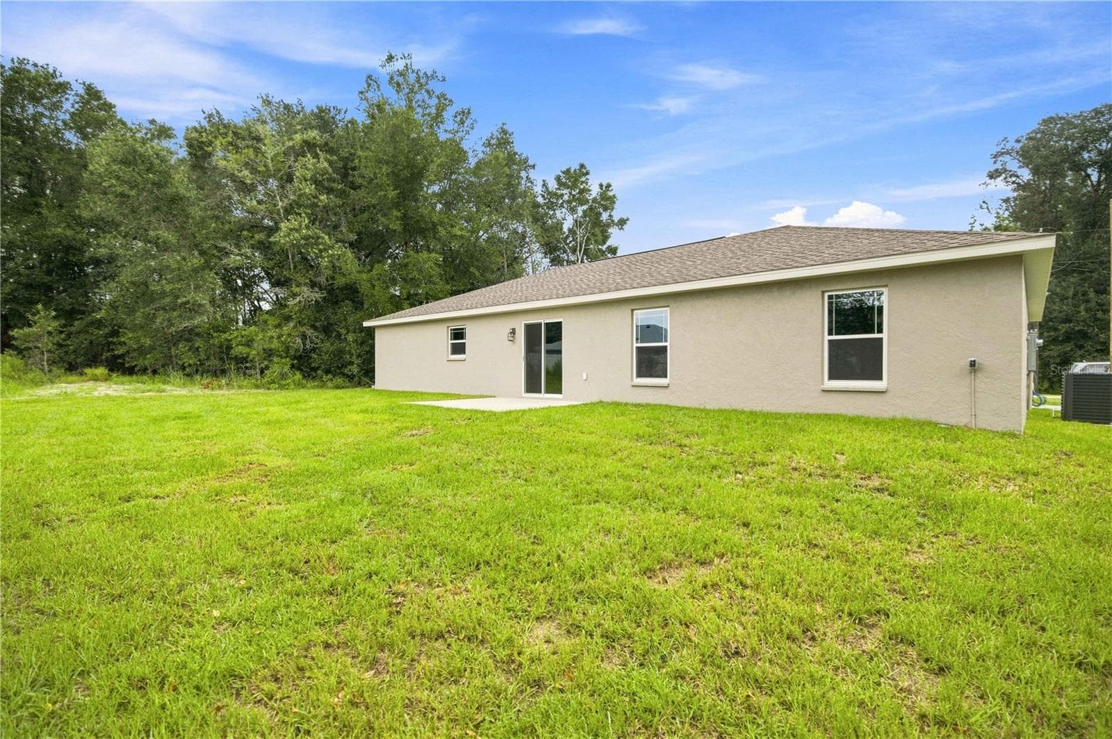 Side View of Home - 13622 SW 112TH ST, DUNNELLON