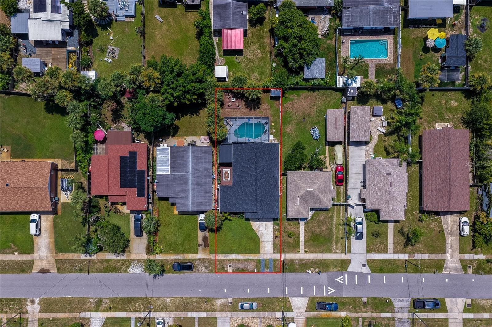 Direct overhead aerial view mapping out the property boundaries, surrounding residential neighborhood, and lot size. - 348 WOODLAND AVE, DAYTONA BEACH