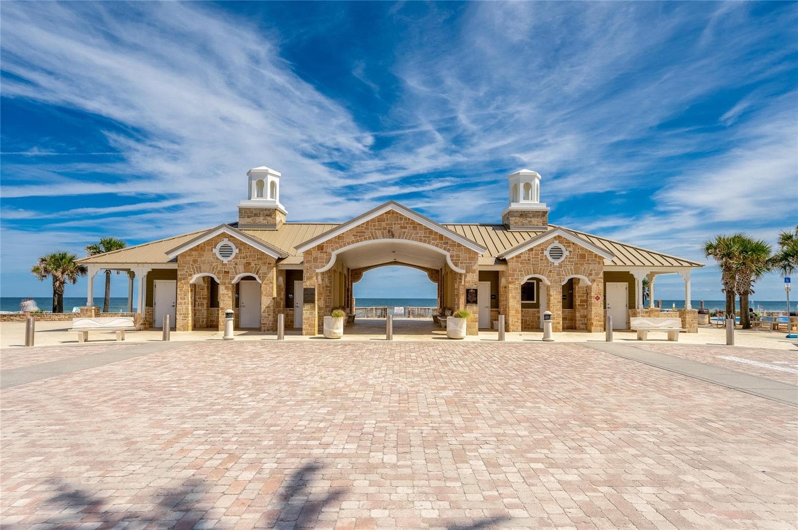 Attractive oceanfront pavilion at Andy Romano Beachfront Park provides a distinctive coastal setting with the Atlantic Ocean visible through the central breezeway. - 348 WOODLAND AVE, DAYTONA BEACH