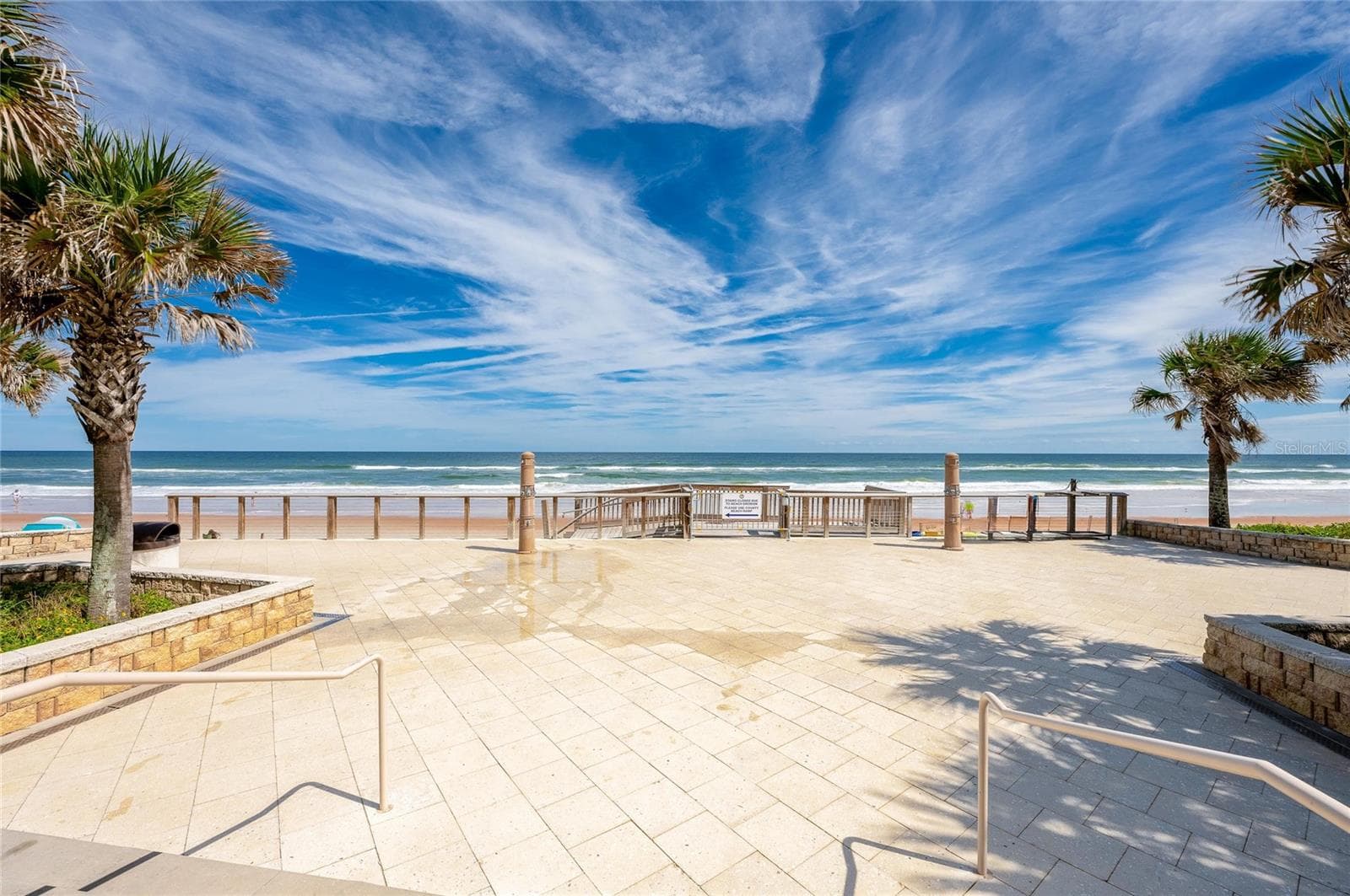 Expansive view from Andy Romano Beachfront Park showcases direct beach access and sweeping views of the Atlantic Ocean. - 348 WOODLAND AVE, DAYTONA BEACH