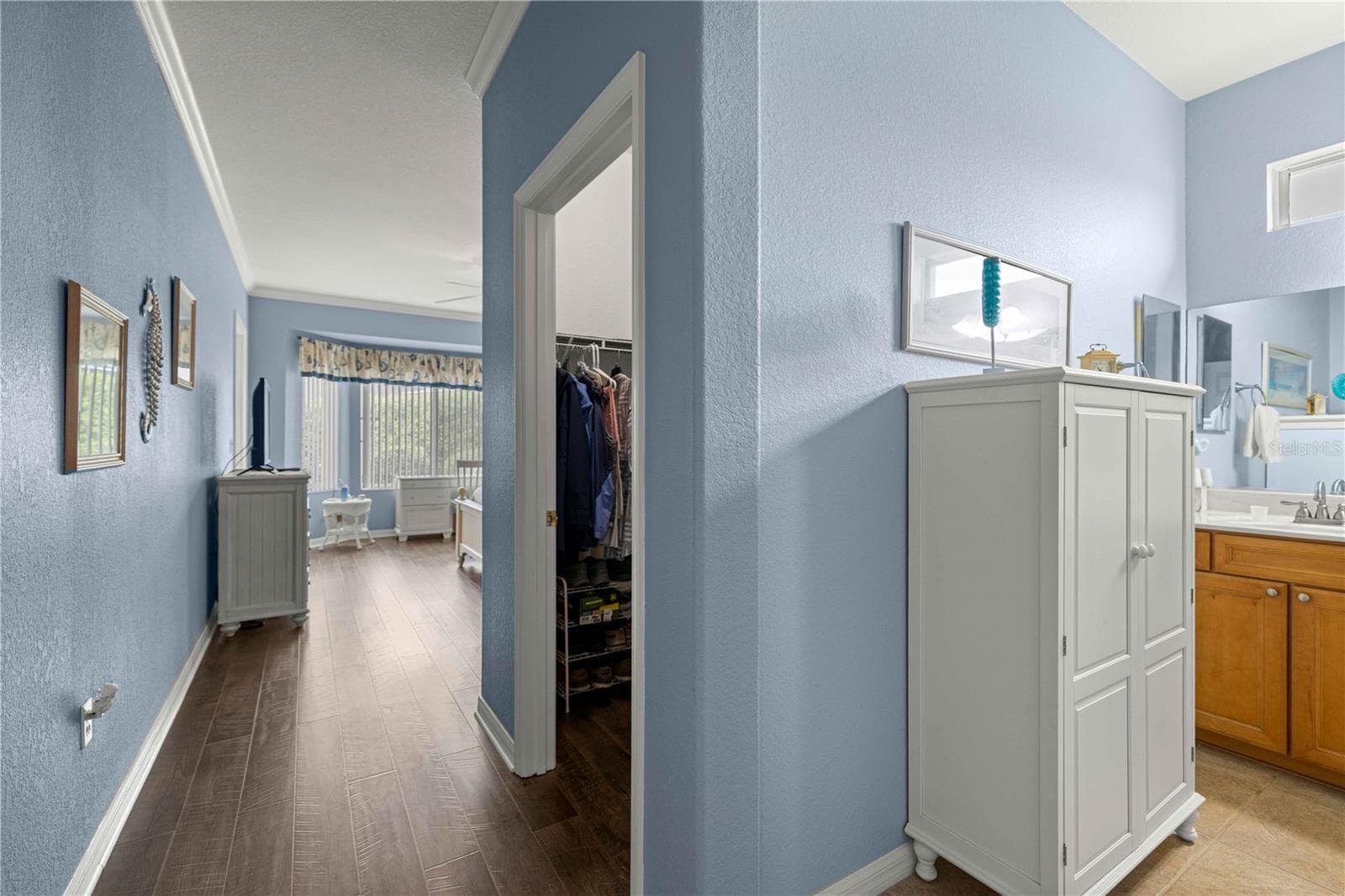 Hallway Entrance to Primary Bedroom and Bath - 9286 SE 128TH ST, SUMMERFIELD