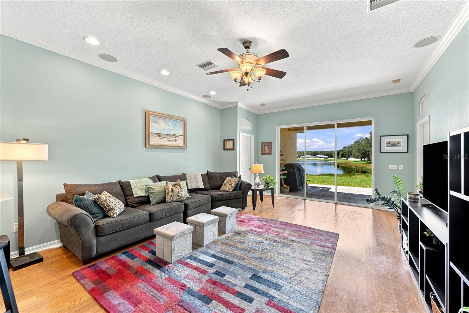 Your Family Room takes advantage of the lovely outdoor views - 18022 LAKE REFLECTIONS BLVD, LUTZ