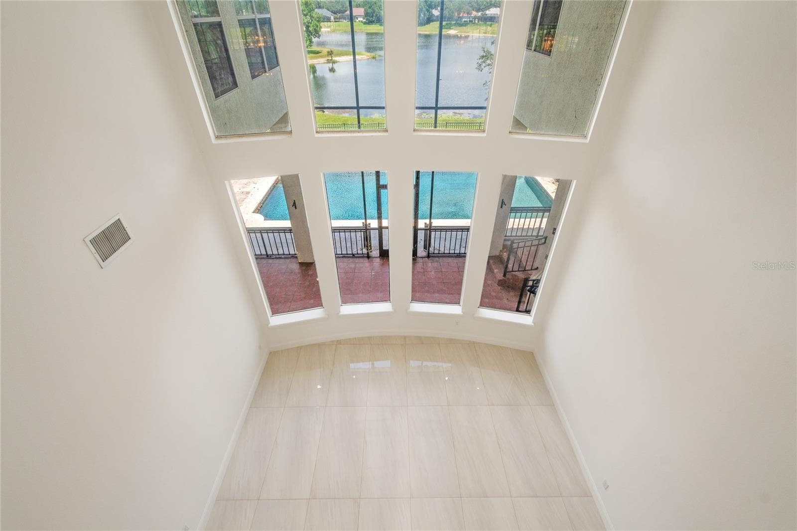 Looking down to Living Room - 672 STONEFIELD LOOP, LAKE MARY