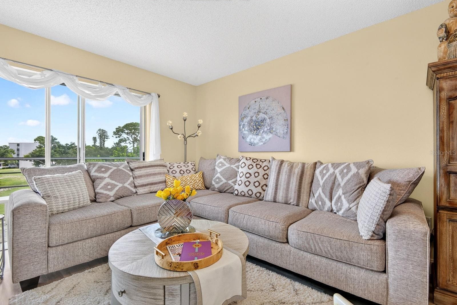 Close up of living room couch - 4240 IRONWOOD CIR #302A, BRADENTON