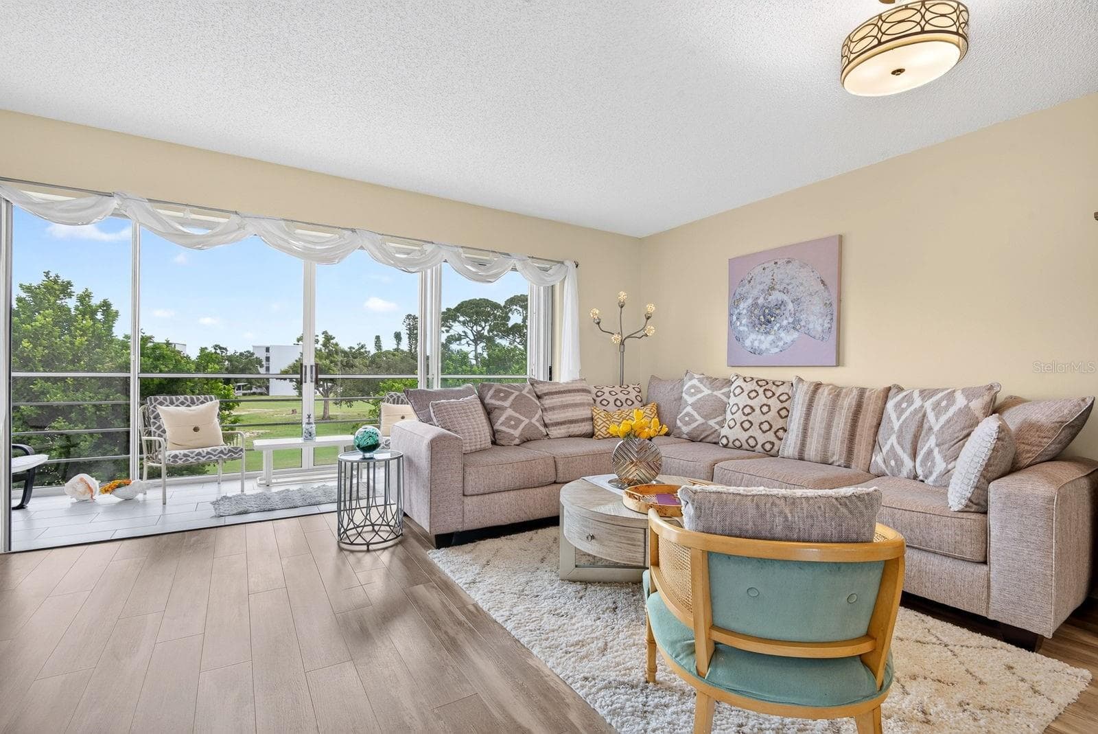 Living area facing Northeast - 4240 IRONWOOD CIR #302A, BRADENTON