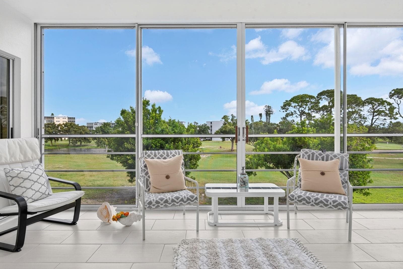 Lanai facing North over golf course - 4240 IRONWOOD CIR #302A, BRADENTON