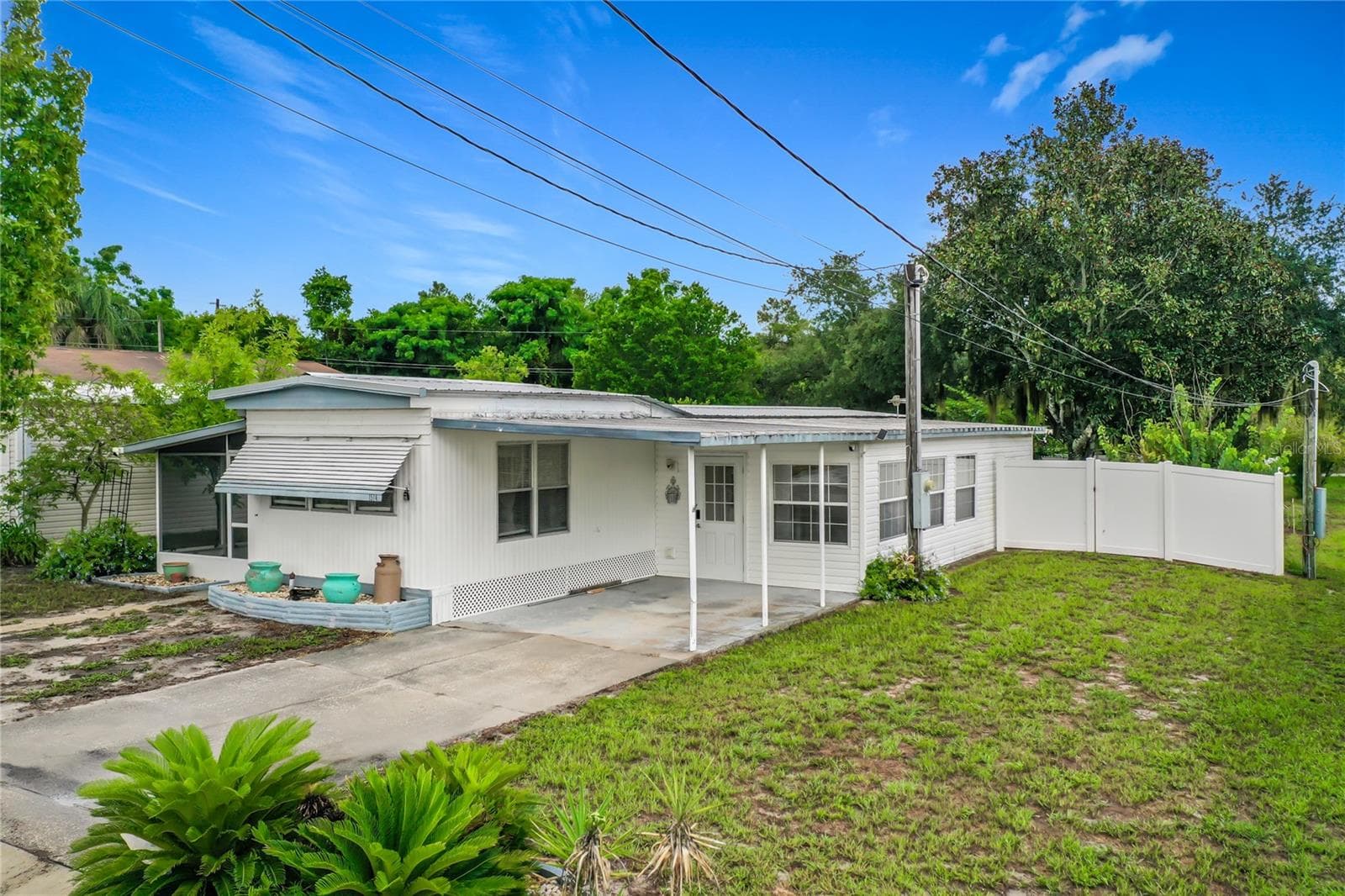 House and Carport - 1514 RIDGE RD, TAVARES