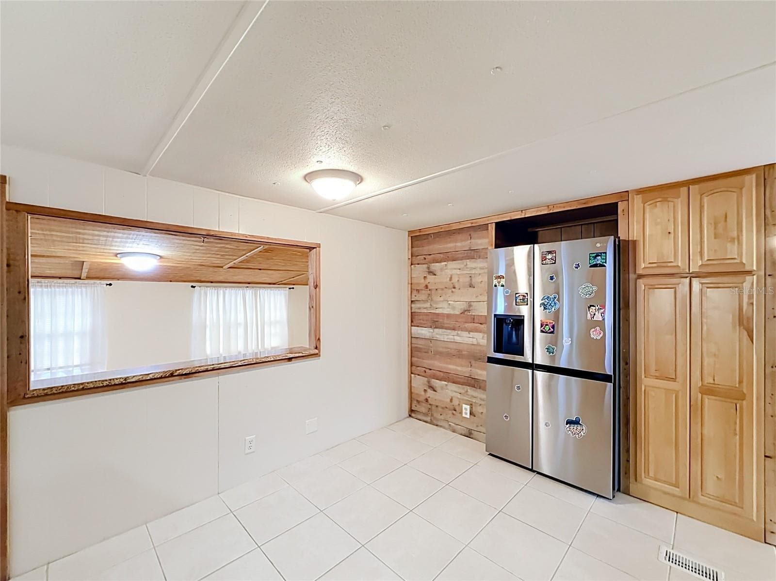 Pass through Window to Dining Room - 1514 RIDGE RD, TAVARES
