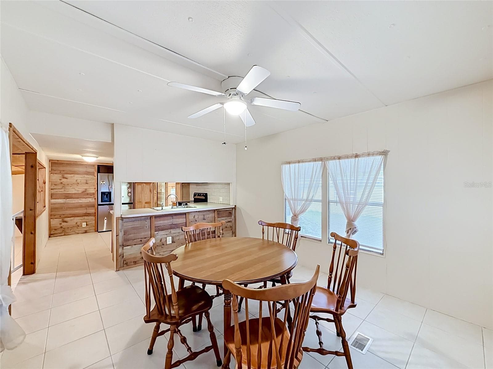 Dining Room Open to Kitchen - 1514 RIDGE RD, TAVARES