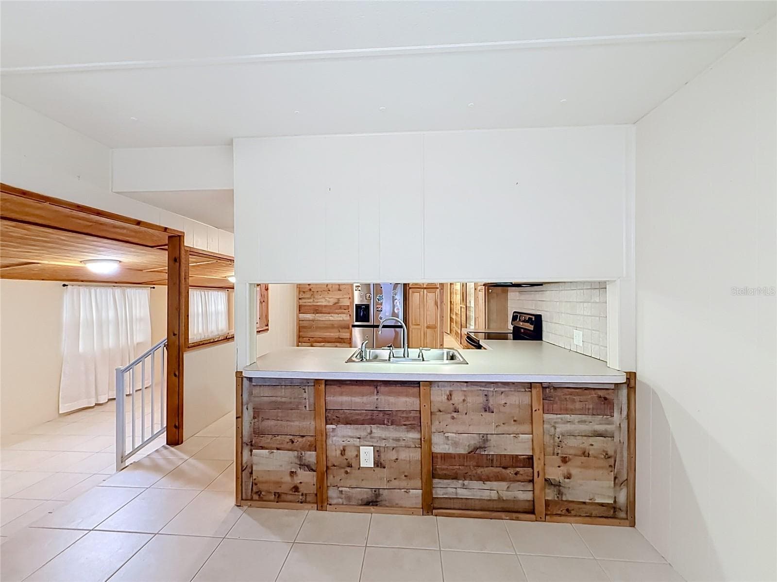 Pass through Window - 1514 RIDGE RD, TAVARES