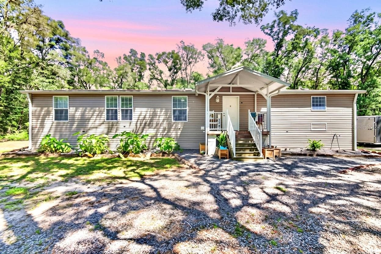 Manufactured Home at 21812 FIELD OF DREAMS LN, DADE CITY, photo 2 of 58