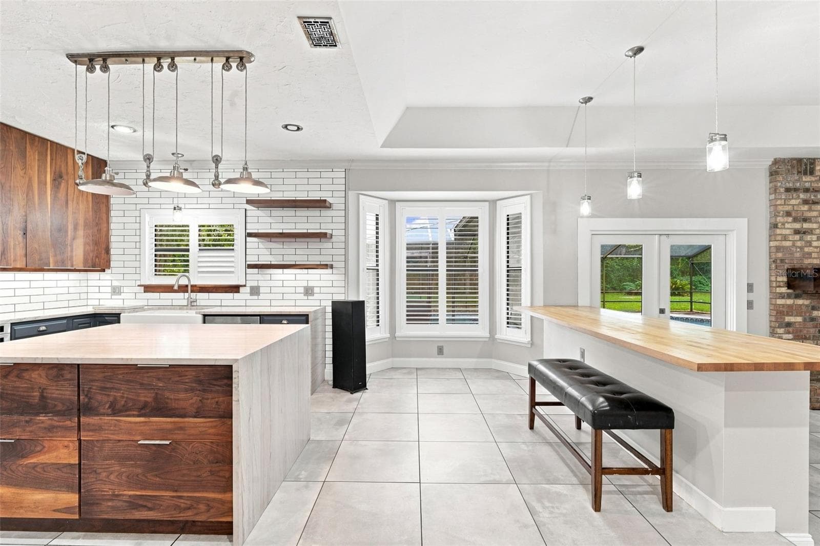 KITCHEN WITH BAR SEATING - 1530 W BERESFORD RD, DELAND