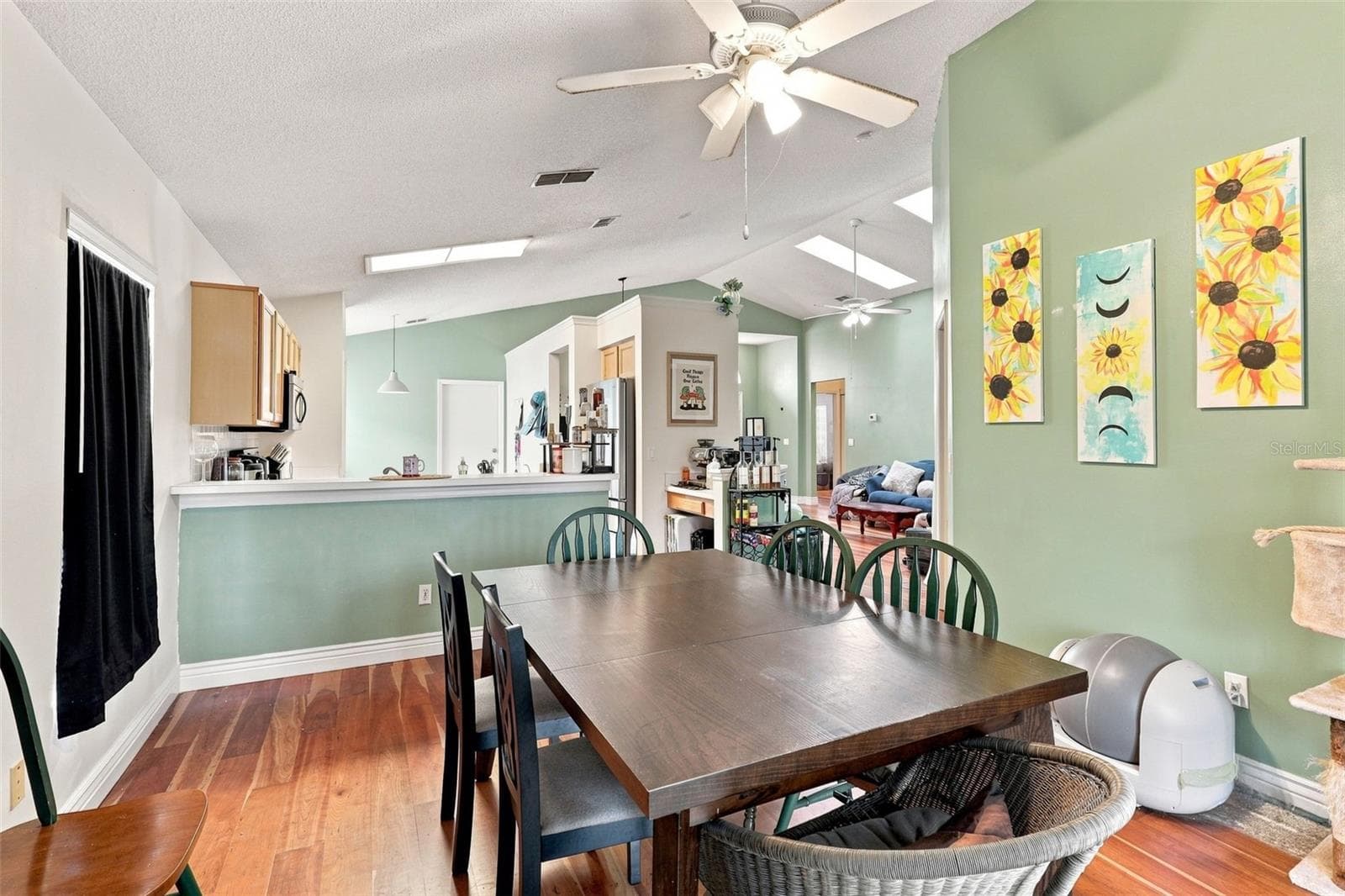 The kitchen opens to the main living areas, creating an easy flow for everyday living and entertaining. - 13637 EMERALDVIEW DR, ORLANDO